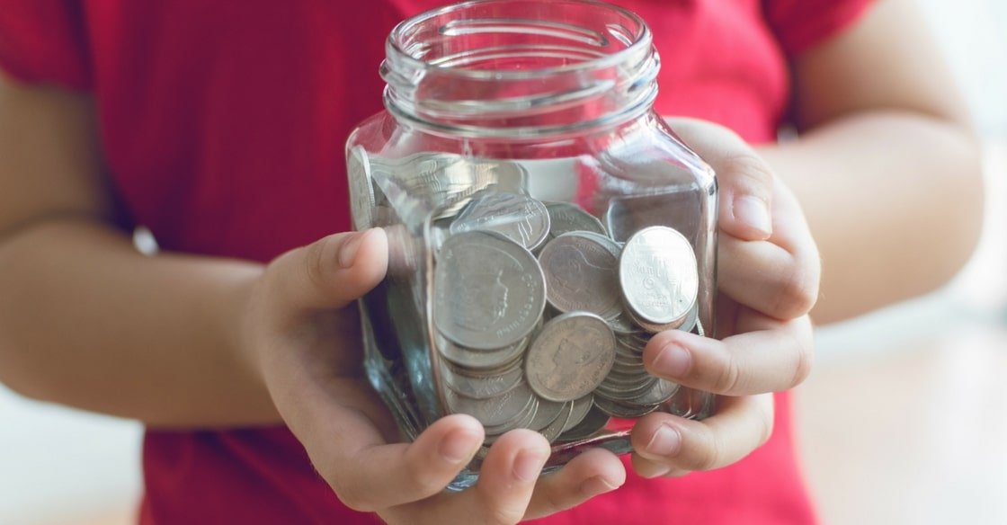 When it comes to teaching kids about money, you may be wondering what to cover. This guide includes everything children need to know about money. #teachingkidsaboutmoney