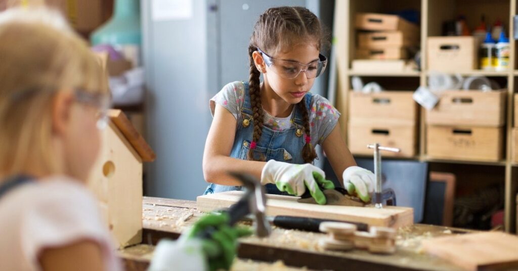 girls woodworking, summer activities for kids