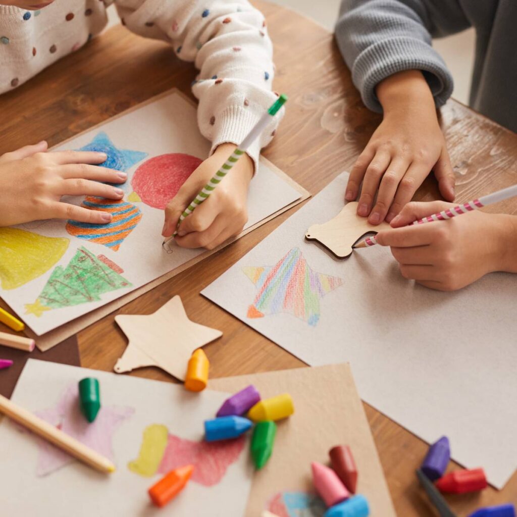 kids taking wooden shapes and tracing them on paper