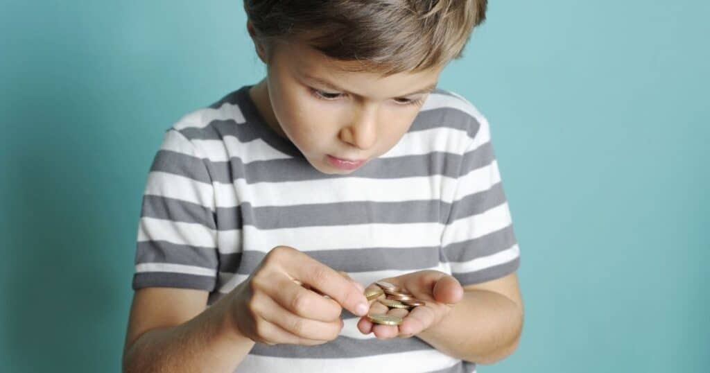 boy counting money